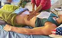 Stomach massage Thai style